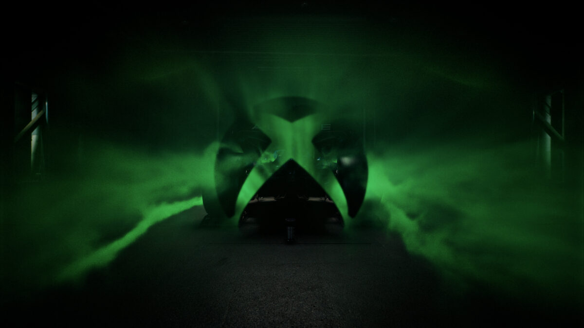 Xbox is celebrating being the new Official Console Partner of the BWT Alpine Formula 1 racing team with a global social media campaign, here depicting the F1 logo, with green smoke pouring off it