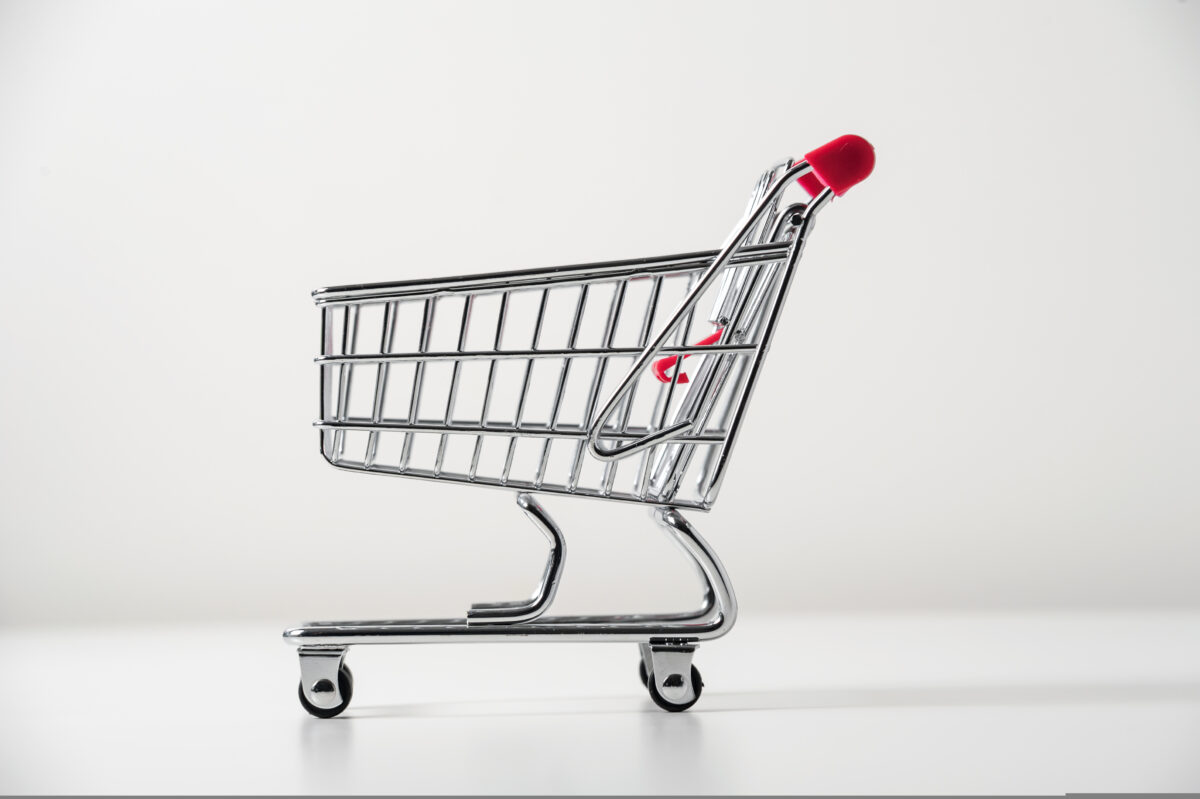 A small trolley against a white background is used to represent retail media. Retail media spend is expected to reach £121.1bn ($153.3bn) before the end of the year, according to Warc's new 'Future of  Digital Commerce' report.