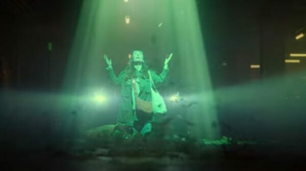 Sally is overwhelmed by a bright green light. Currys' mobile virtual network iD Mobile is encouraging viewers to 'see the light' about the savings it can make by switching from a major network to, in its latest awareness-driving campaign.