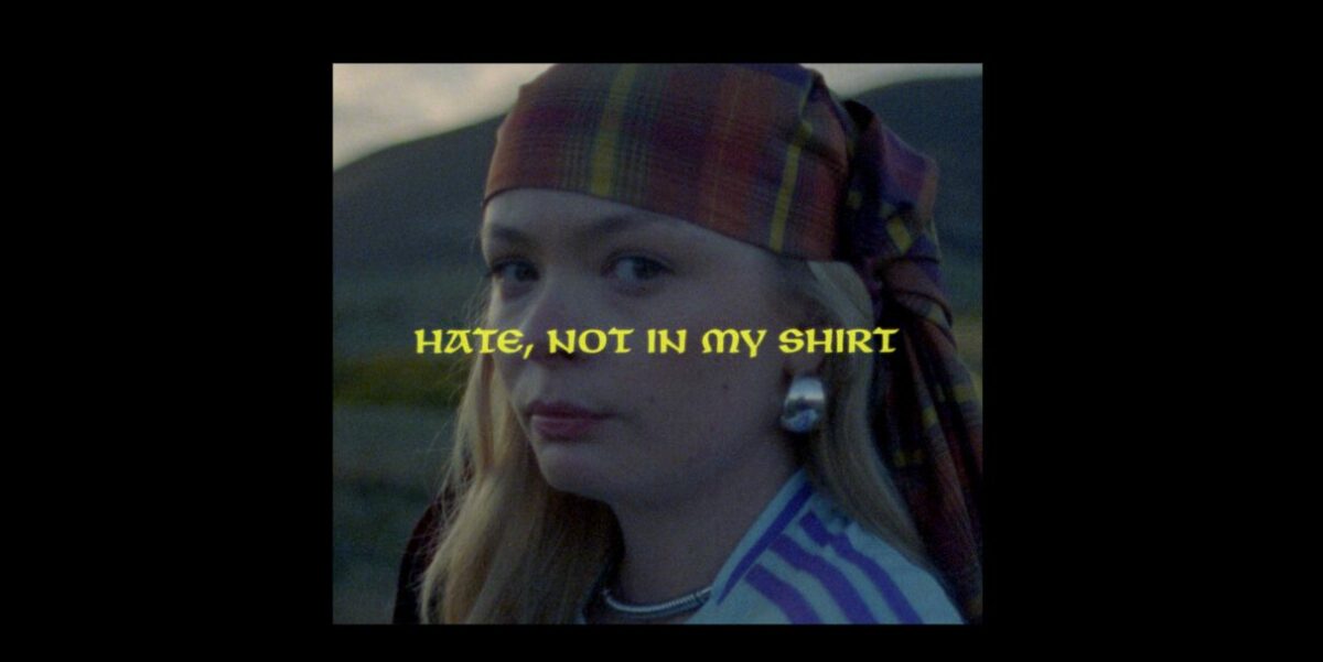 A young Scotland found stands at the glen, proudly with tartan around her head "Not In My Shirt! reads text in front. EE ad is kicking off its 'Not In My Shirt' campaign with a rousing TV ad launching during England vs Scotland tonight (14 June).
