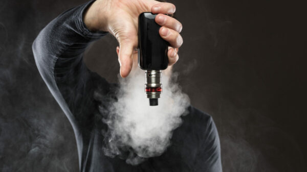 A figures holds a vape, appears like a thumbs down.The ASA (Advertising Standards Authority) has banned a series of three vaping adverts, for indirectly promoting unlicensed nicotine containing e-cigarettes and their components via affiliate links.